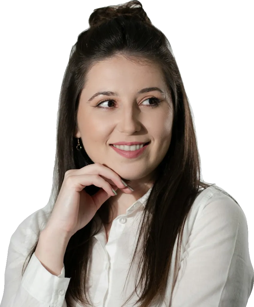 Smiling entrepreneur resting her chin on her hand
